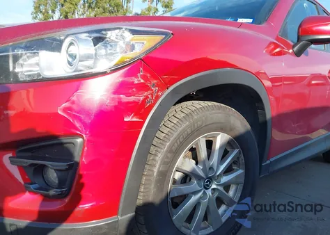 2016 Mazda Cx-5 Touring z USA, uszkodzony, nr VIN JM3KE4CY3G0847857